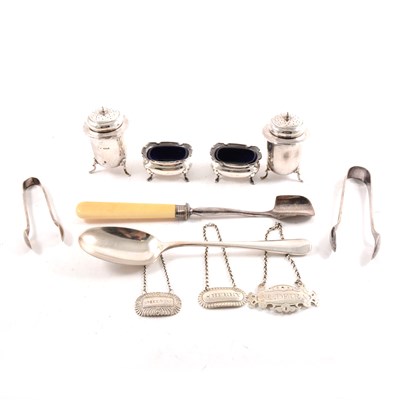 Lot 195 - A collection of silver to include an antique marrow spoon, salts, peppers, wine labels etc.