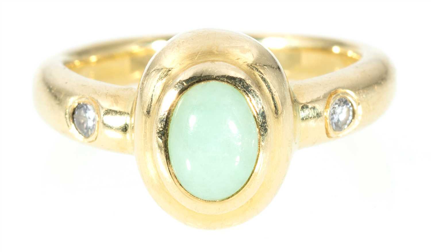Lot 210 - A jade and diamond dress ring