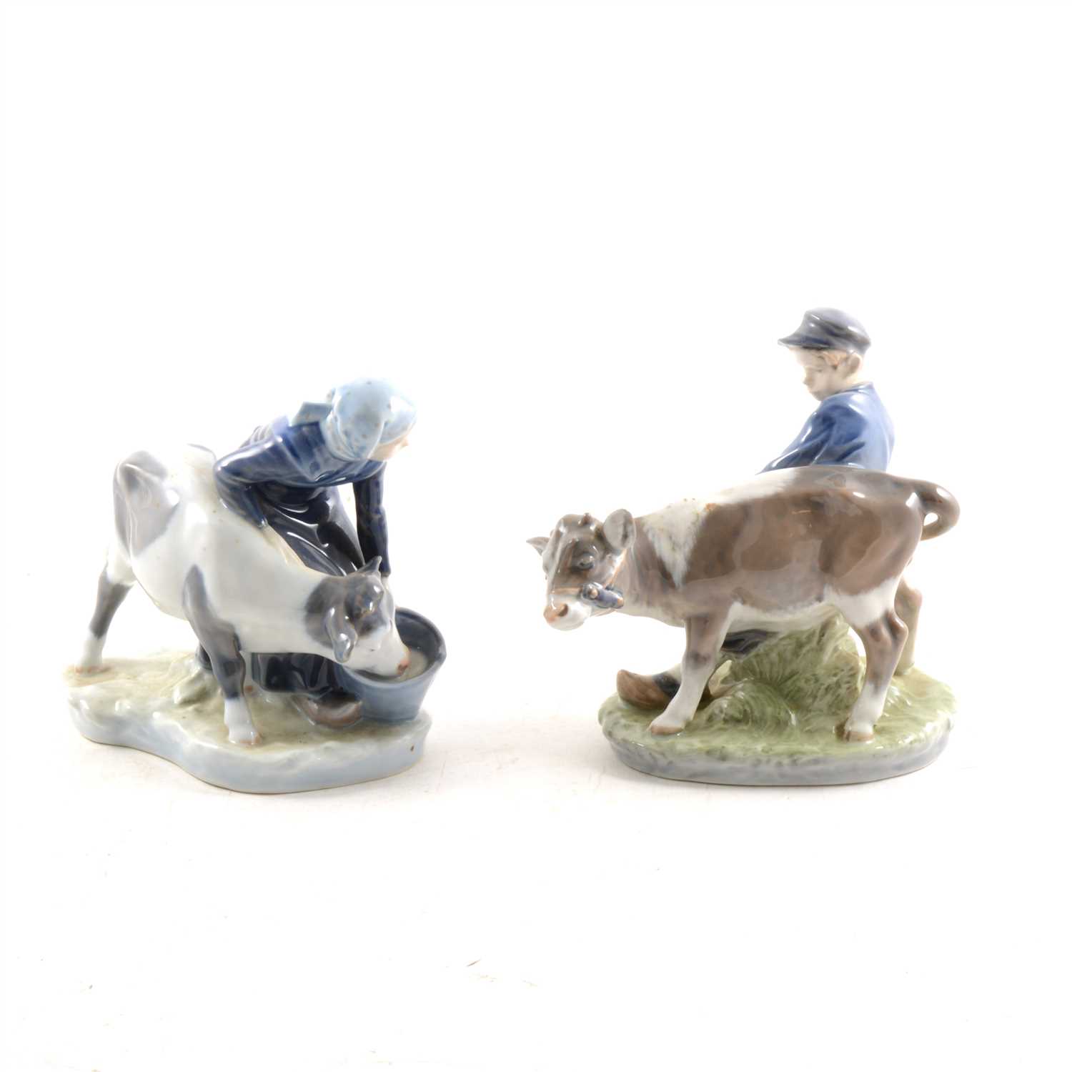 Lot 40 - Pair of Royal Copenhagen porcelain models, Boy with Calf, and Girl with Calf