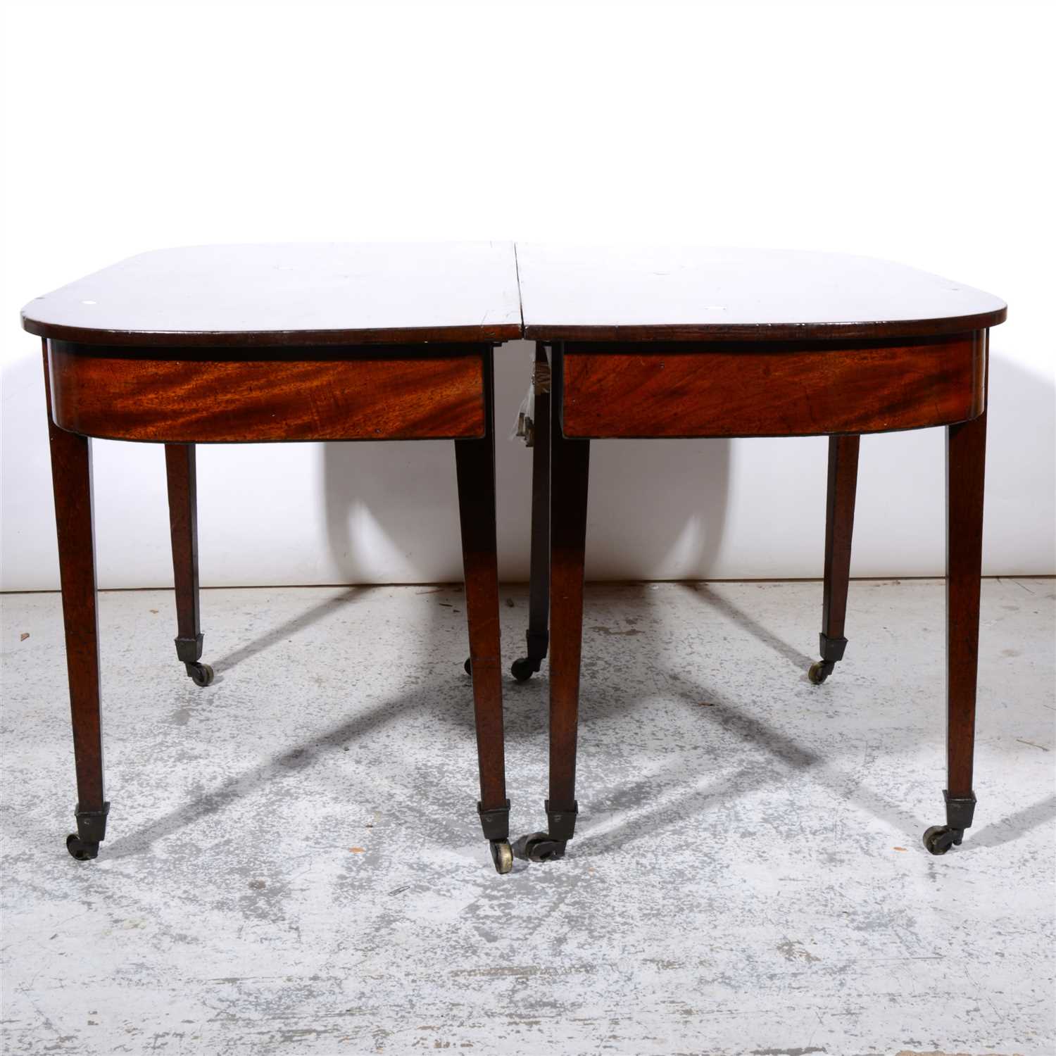 Lot 465 - George III mahogany dining table