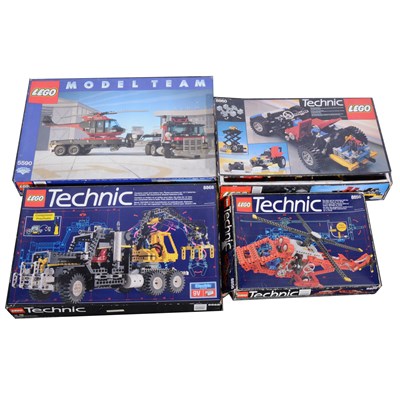 Lot 179 - Four Lego Technic box sets, including Team 'Worl N' Wheel' supertruck helicopter set