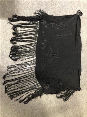 Lot 180 - Two black fringed piano shawls