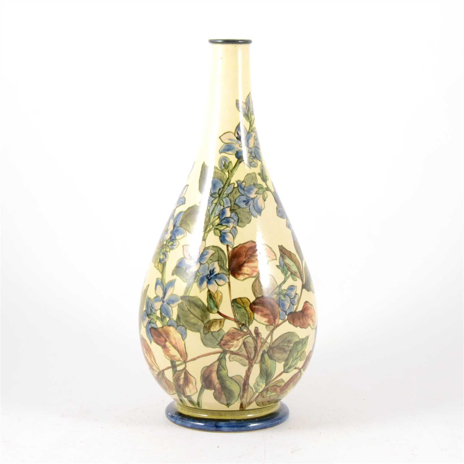 Lot 22 - A Doulton Faïence vase decorated with blue flowers