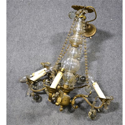 Lot 193 - A gilt metal four-light chandelier