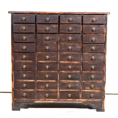 Lot 467 - A stained wood table top nest of drawers