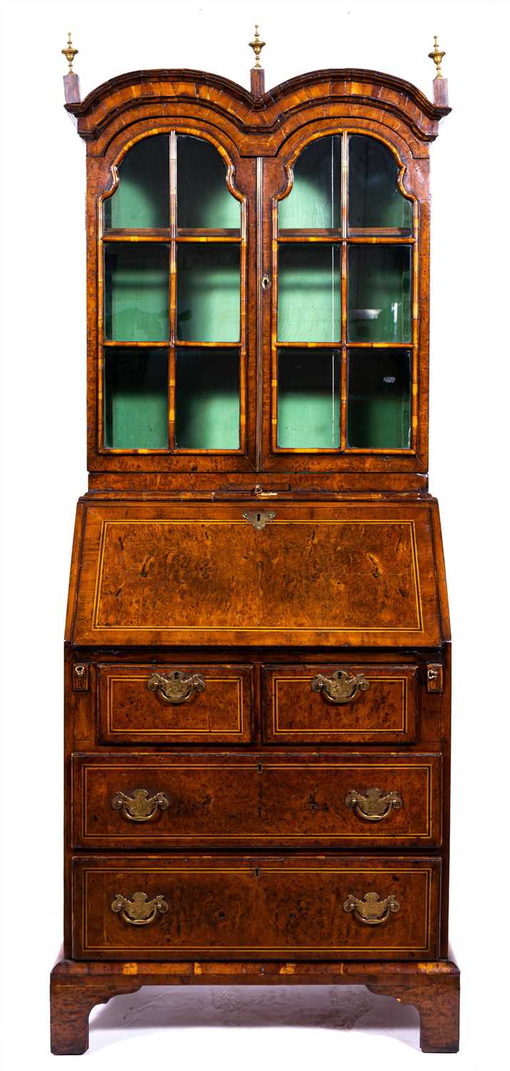 Lot 443 - A George II style yew and stained wood bureau bookcase