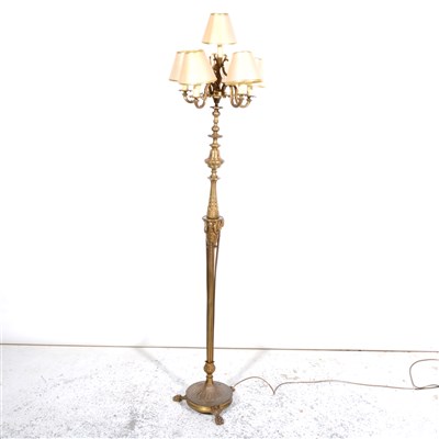 Lot 343 - A cast brass six light floor standing candelabra