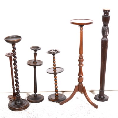 Lot 371 - A mahogany torchere, stands, and smoker's companions