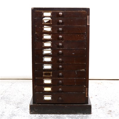 Lot 402 - A bank of stained wood file drawers