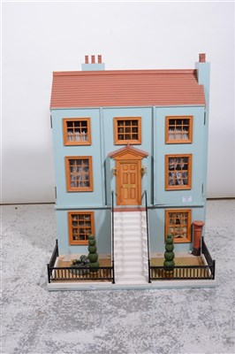 Lot 269 - A doll's house, designed as an early Victorian three-storey town-house, ...