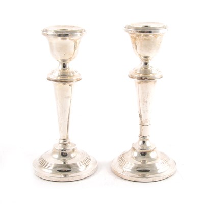 Lot 353 - A pair of silver candlesticks