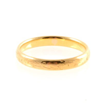 Lot 208 - A 22 carat yellow gold wedding band