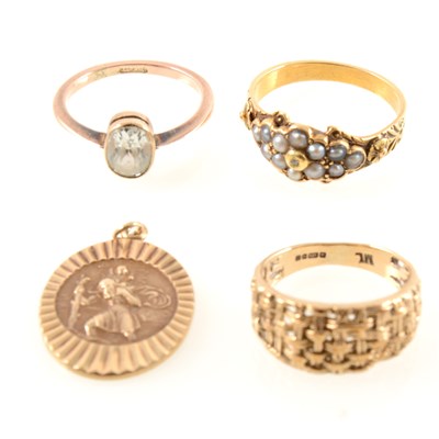 Lot 211 - Three gold rings and a 9 carat yellow gold St Christopher.