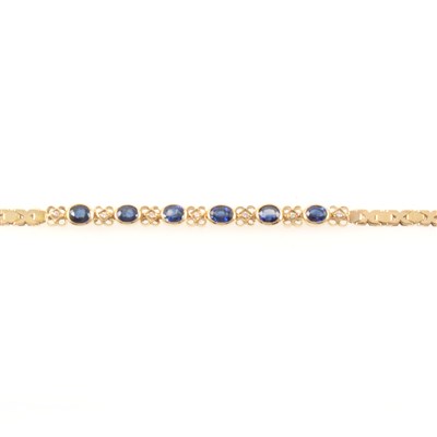 Lot 263 - A sapphire and diamond bracelet.