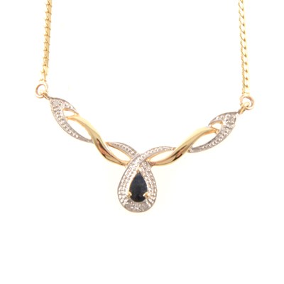 Lot 256 - A 9 carat yellow and white gold necklace with sapphire drop