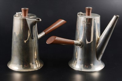 Lot 138 - An Art Deco silver coffee pot and hot water jug, Walker & Hall, Sheffield, 1931.