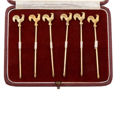 Lot 105 - Set of six gilt metal cocktail sticks, marked Sterling Silver