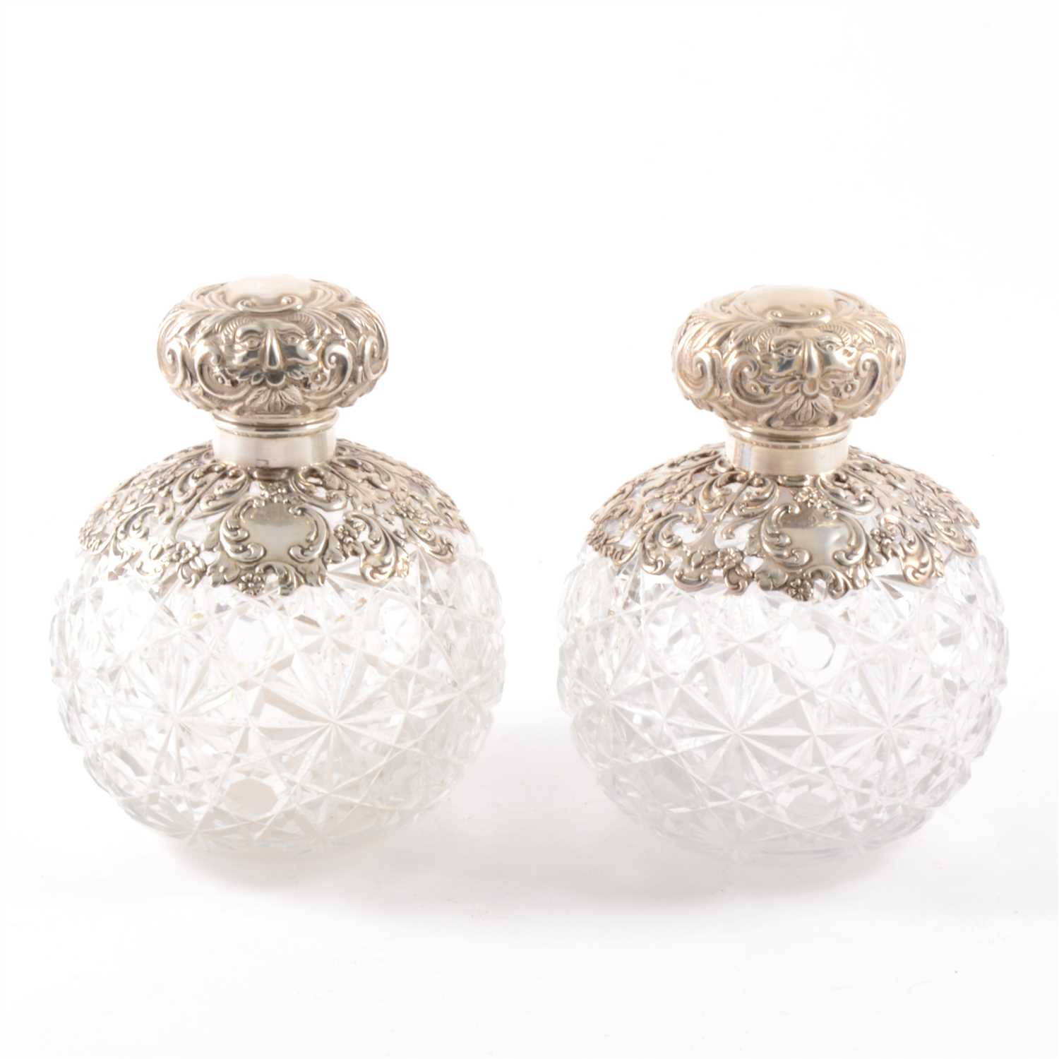Lot 109 - Pair of Edwardian silver mounted cut glass scent bottles, probably William Neale, Chester 1903