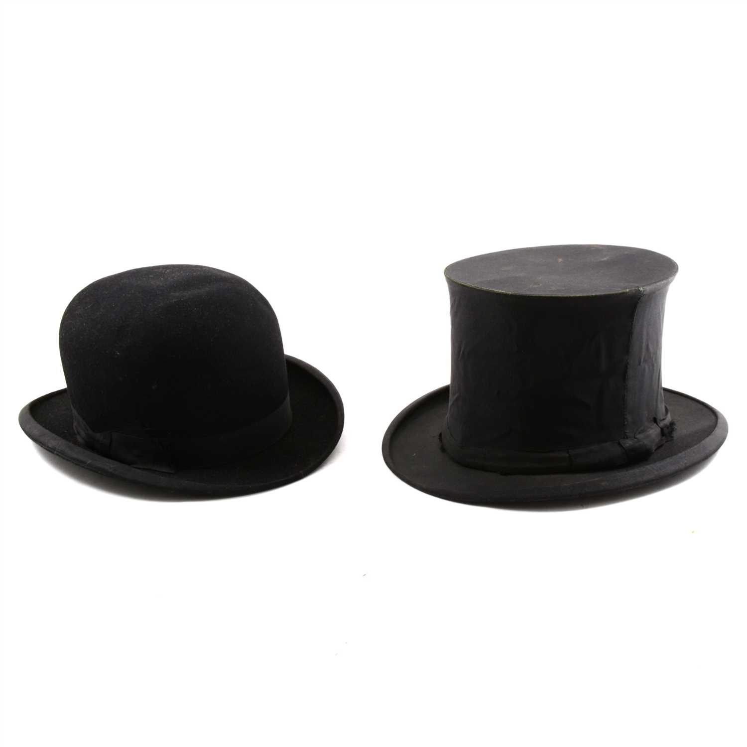 Lot 103 - An opera top hat and a black bowler "Superfine" bowler, pair of ankle guards.