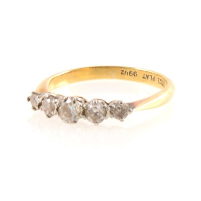 Lot 207 - A diamond five stone ring.