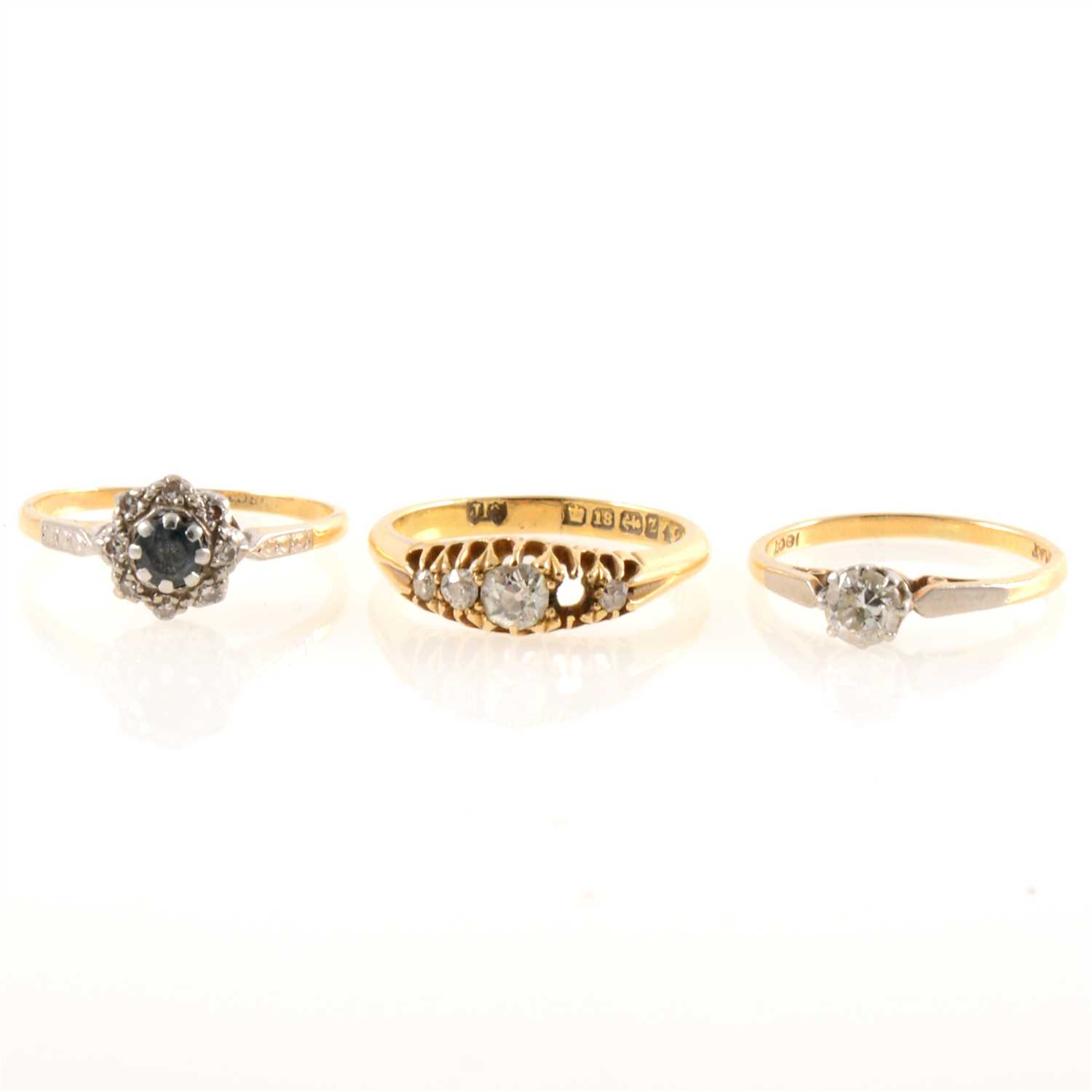 Lot 209 - Three diamond rings.