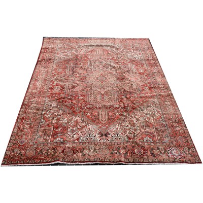 Lot 592 - A Heriz carpet.