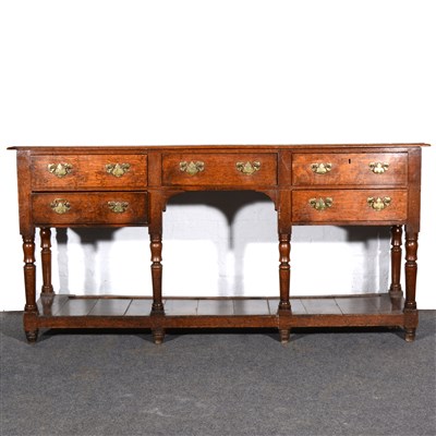 Lot 421 - An oak dresser, in the Georgian style,...