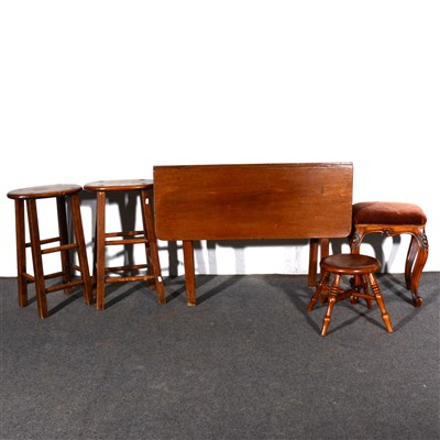 Lot 403 - Two fruitwood and beech stools, with an oval...