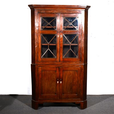 Lot 556 - A George III mahogany free-standing corner...