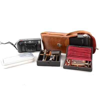 Lot 157 - A Kodak Six-16 junior Camera in leather case, dentist's syringe set in case, a brass mounted drawing set etui labelled J Stacy Bookseller Norwich