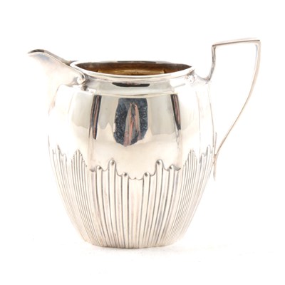 Lot 340 - A silver half fluted cream/small milk  jug by James Dixon & Sons Ltd, Sheffield 1912, 9cm, approximate weight 3oz.