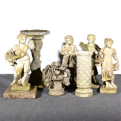 Lot 498 - Four garden statues, a bird bath, and a decorative garden pedestal with fruiting urn.