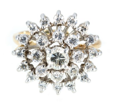 Lot 190 - A circular floral diamond cluster ring.