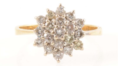 Lot 247 - A diamond cluster ring.