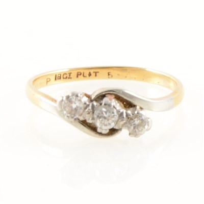 Lot 243 - A diamond three stone ring