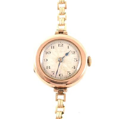 Lot 238 - A lady's 9 carat rose gold wrist watch