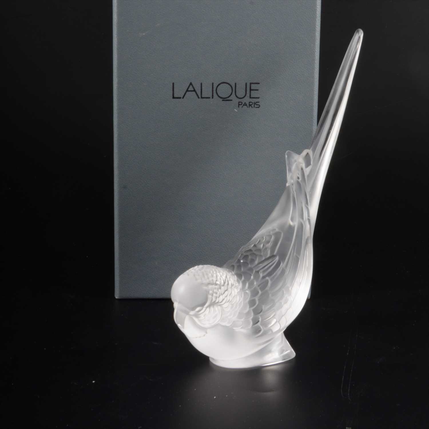 Lot 120 - A 'Perruche (tete baisee)' clear and frosted glass paperweight, by Lalique Crystal.