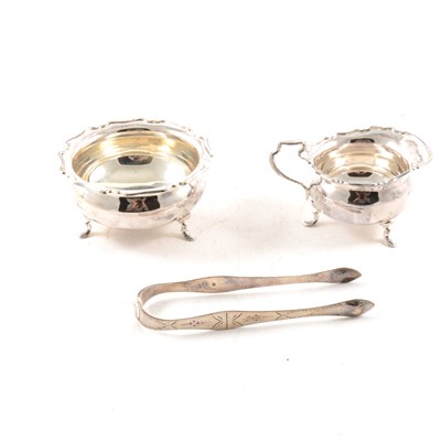 Lot 346 - Silver milk jugand sugar bowl and a pair of sugar tongs