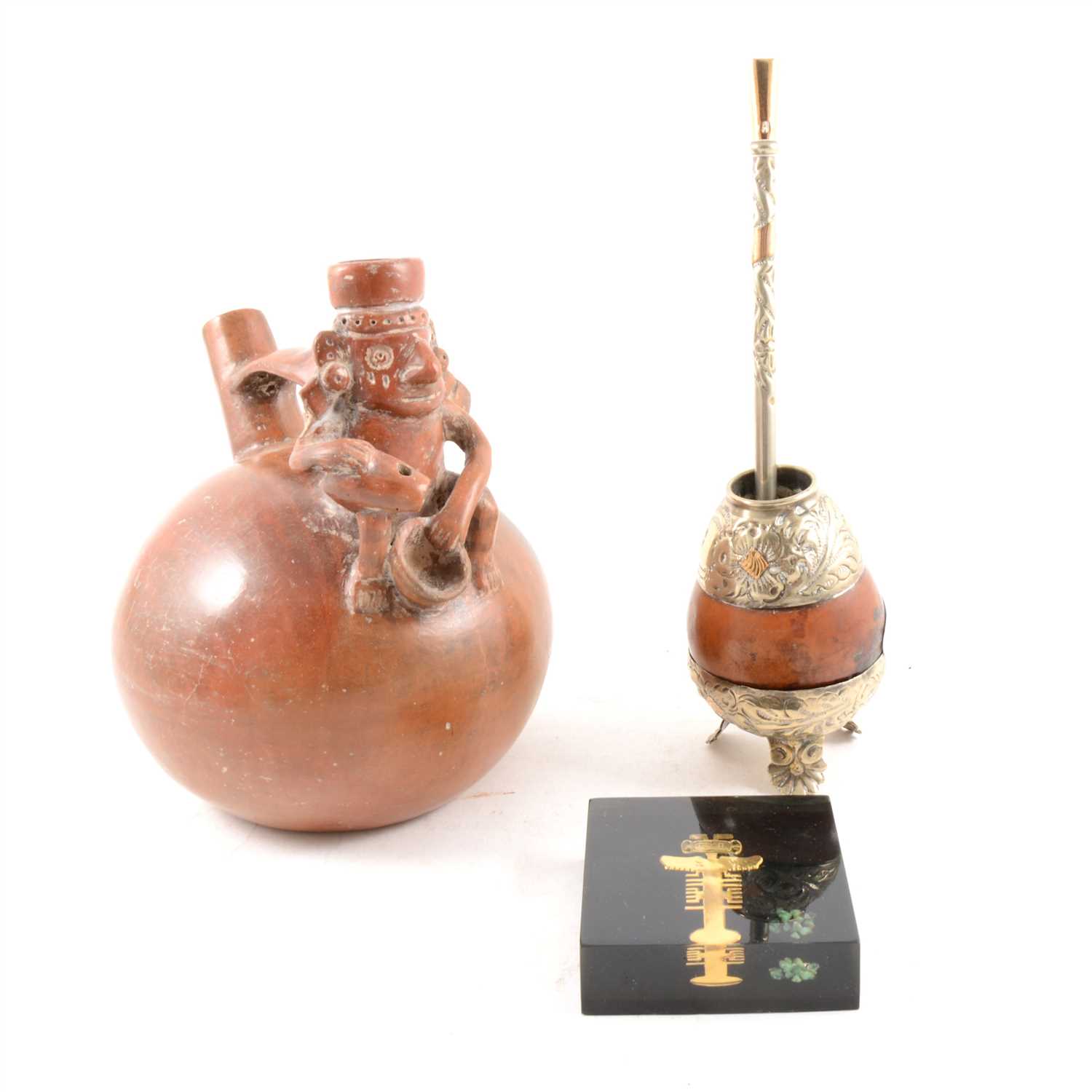 Lot 87 - South American style clay pot, smoking vessel and a paperweight with gold inclusions.