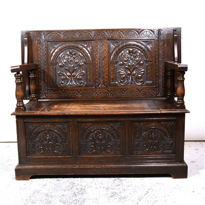 Lot 525 - Carved oak monks bench