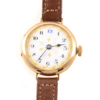 Lot 236 - A lady's 9 carat yellow gold wrist watch