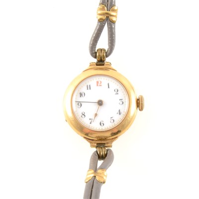 Lot 297 - A lady's 18 carat yellow gold wrist watch.