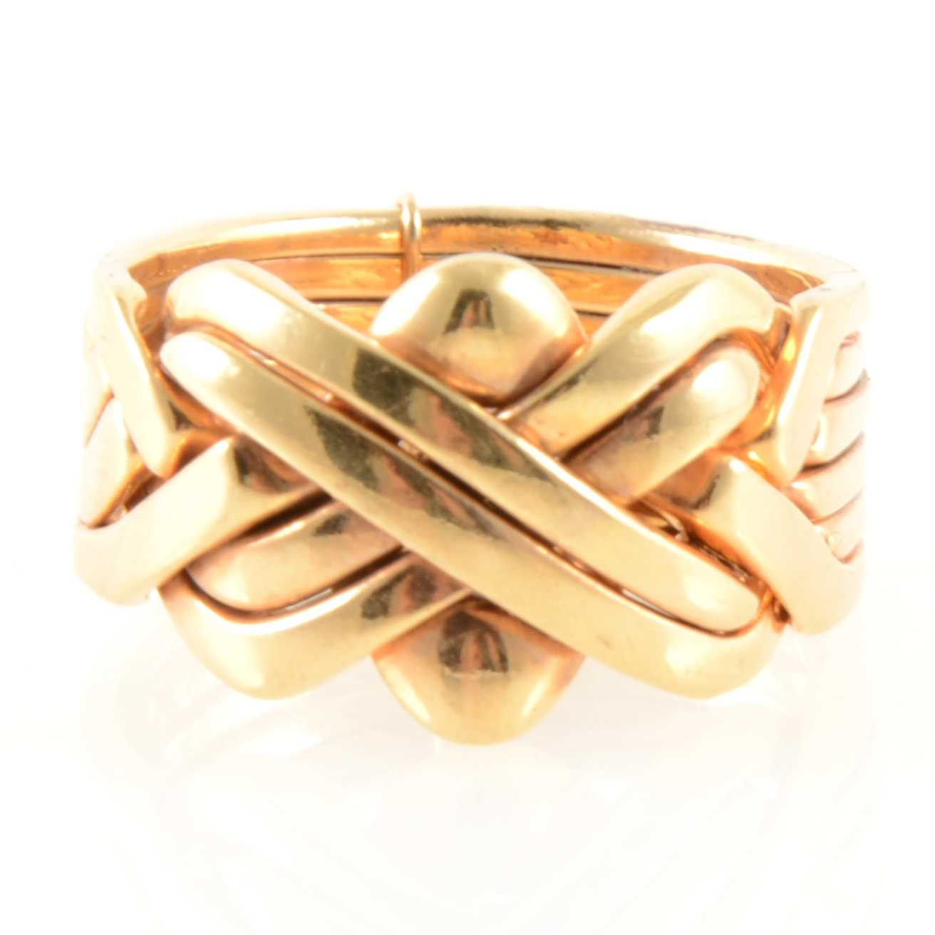 Lot 233 - A yellow metal puzzle ring.