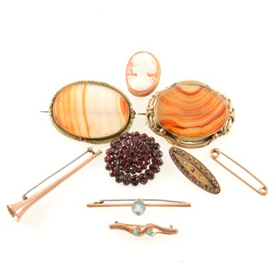 Lot 214 - A collection of Victorian and later brooches.