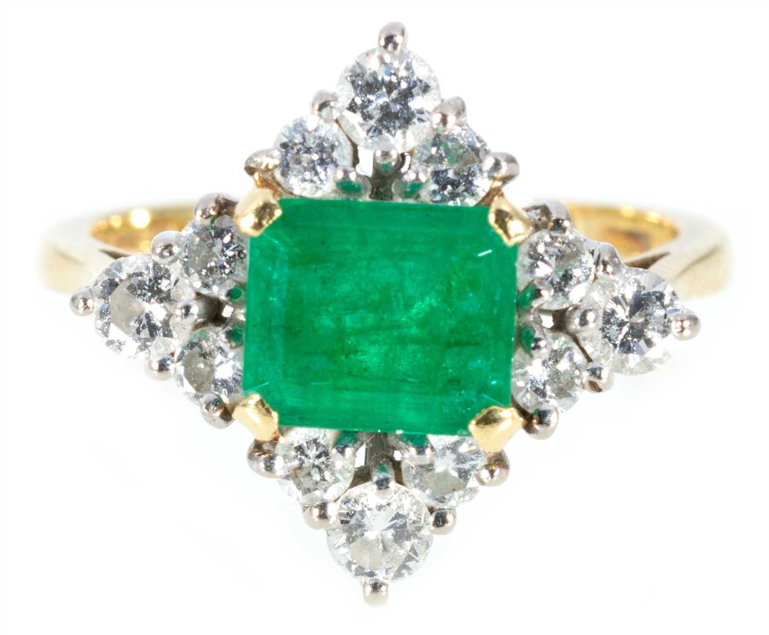 Lot 206 - An emerald and diamond cluster ring.