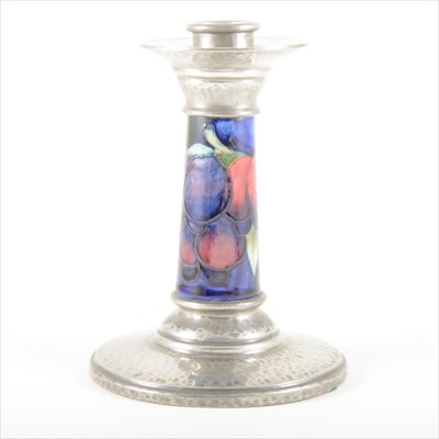 Lot 37 - A 'Wisteria' design pottery candlestick, by William Moorcroft for Liberty & Co.