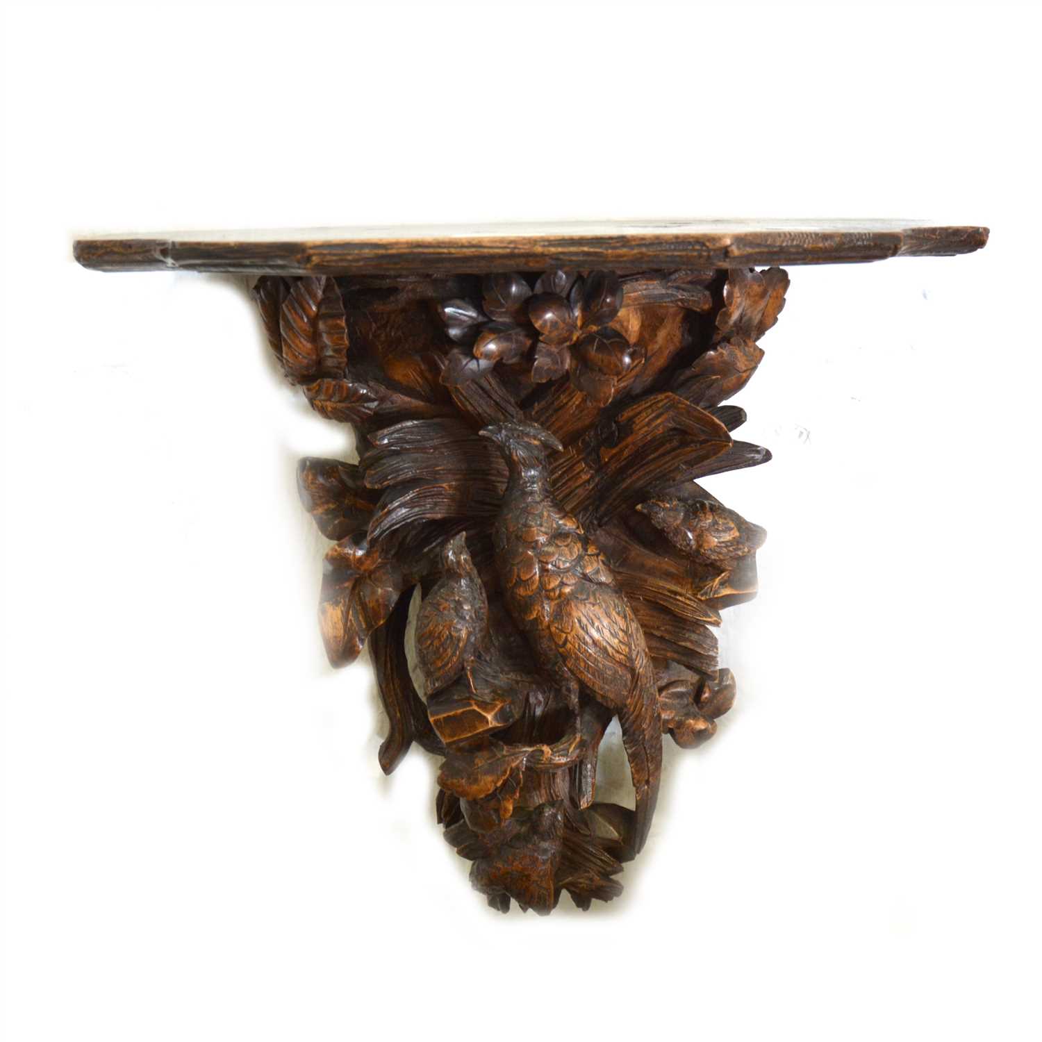 Lot 154 - Black forest carved oak wall bracket