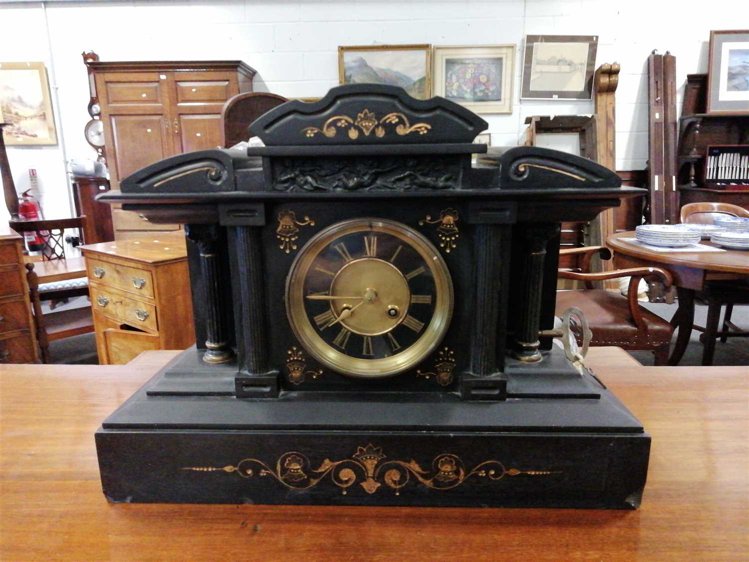 Lot 479 - A Victorian black slate mantel clock