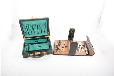 Lot 146 - A manicure set, marked Saphir Grob in a black leather case, ...