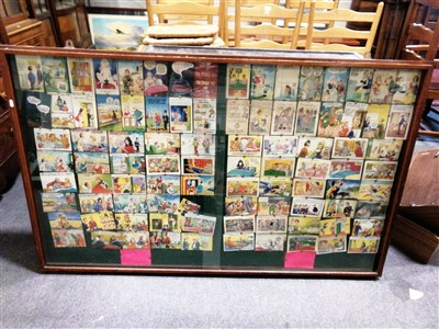 Lot 580 - Postcards in a wall mounted case